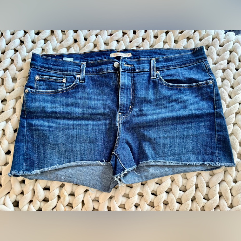 Levi’s mid-length cut off denim shorts
